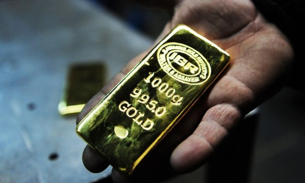 Đồng USD mạnh lên, gây sức ép với thị trường vàng thế giới
