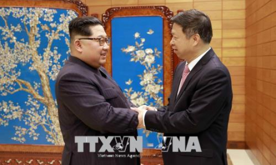 Ông Kim Jong-un thảo luận với quan chức Trung Quốc về tăng cường quan hệ chiến lược