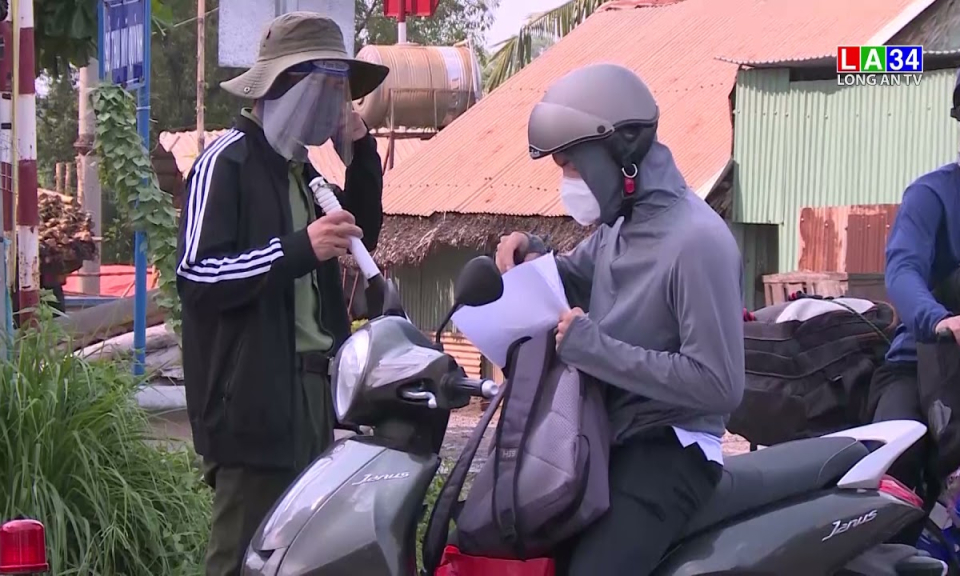 Long An hỗ trợ người dân có đủ điều kiện về quê qua chốt