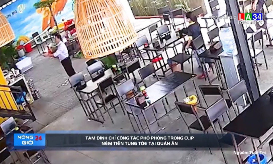Tạm đình chỉ phó phòng trong clip ném tiền tung tóe tại quán ăn