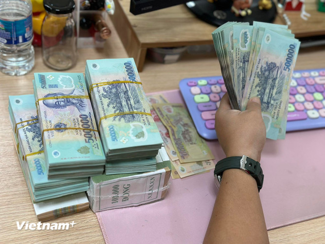 Doanh nghiệp mong muốn ngân hàng tạo điều kiện, ưu đãi lãi suất cho lĩnh vực tư nhân. (Ảnh: Vietnam+)