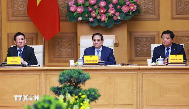Thủ tướng Phạm Minh Chính gặp mặt đại diện các doanh nghiệp Hoa Kỳ đang đầu tư, kinh doanh tại Việt Nam. (Ảnh: Dương Giang/TTXVN)