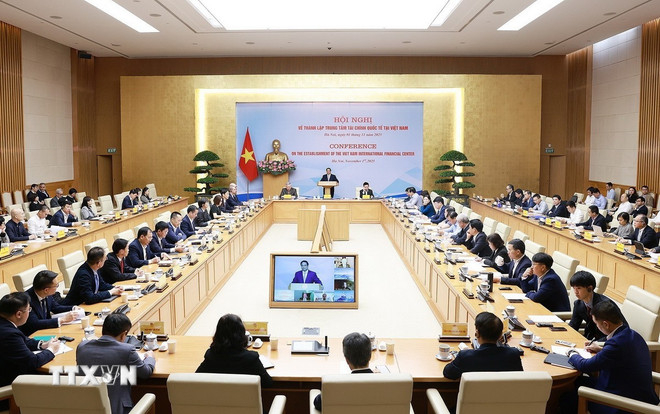 Hội nghị tham vấn các chuyên gia, tổ chức trong nước và quốc tế về thành lập Trung tâm tài chính quốc tế tại Việt Nam. (Ảnh: Dương Giang/TTXVN)