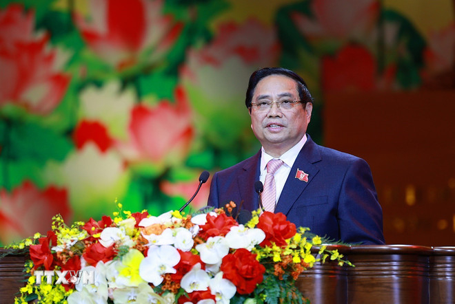 Thủ tướng Phạm Minh Chính, Chủ tịch Hội đồng Thi đua-Khen thưởng Trung ương phát biểu khai mạc Đại hội Thi đua yêu nước lần thứ XI (Ảnh: Dương Giang/TTXVN)